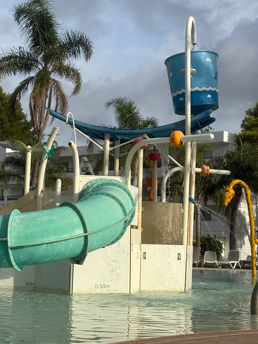 Jungle gym, water slide and tipping bucket