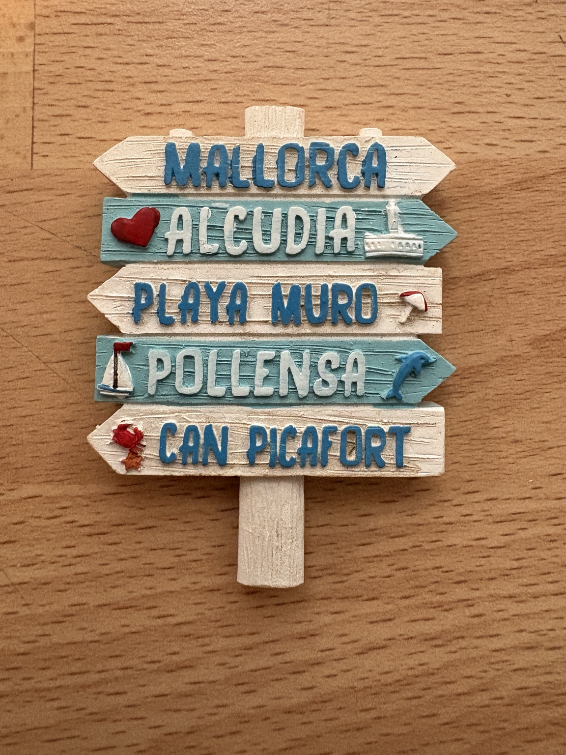 Mallorca directional-sign fridge magnet featuring Alcúdia, Playa Muro, Pollensa and Can Picafort
